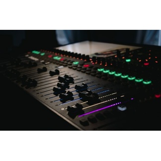 mixing board with glowing lights